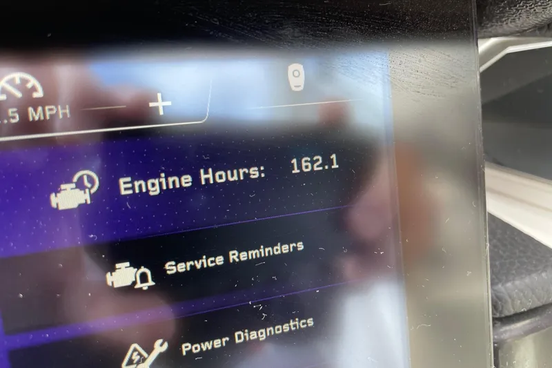 Slide: The Image of 2023 Nautique Super Air Nautique G25 Paragon display showing 162.1 engine hours. - 13