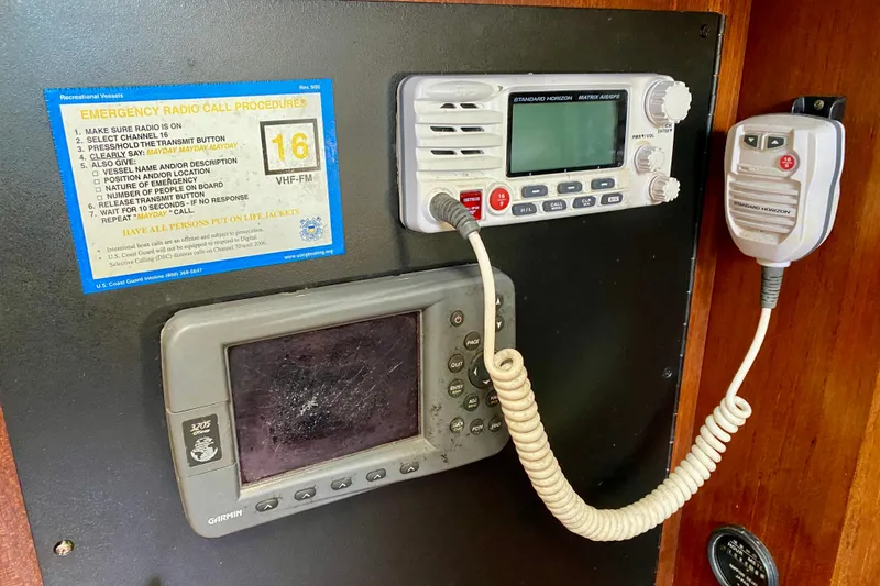 Slide: The Image of VHF radio and GPS system on 1994 Island Packet 44 sailboat. - 125