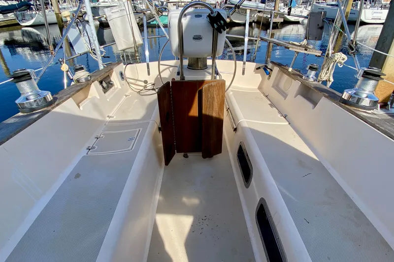 Slide: The Image of Cockpit of a 1994 Island Packet 44 sailboat, docked at a marina. - 17