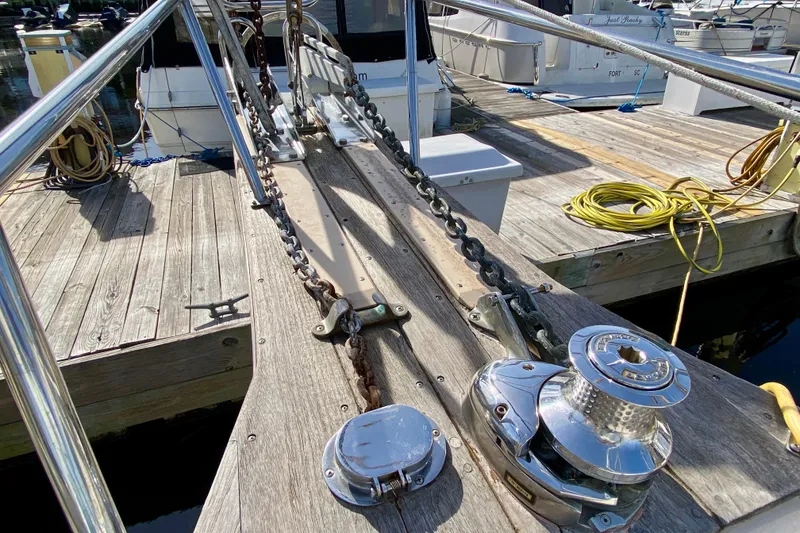 Slide: The Image of Deck of 1994 Island Packet 44 sailboat with anchor chain and winch. - 27
