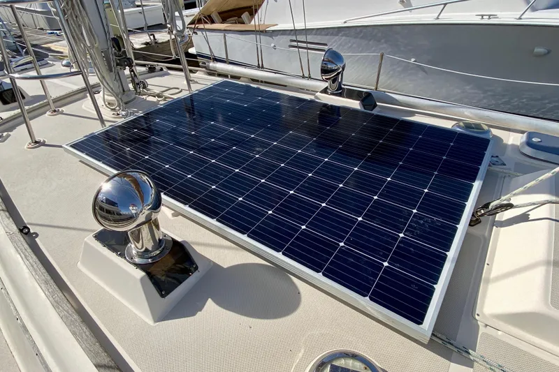 Slide: The Image of Solar panel on 1994 Island Packet 44 yacht deck, docked at marina. - 31