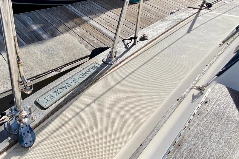 Slide: The Image of Deck view of a 1994 Island Packet 44 sailboat at a dock. - 33