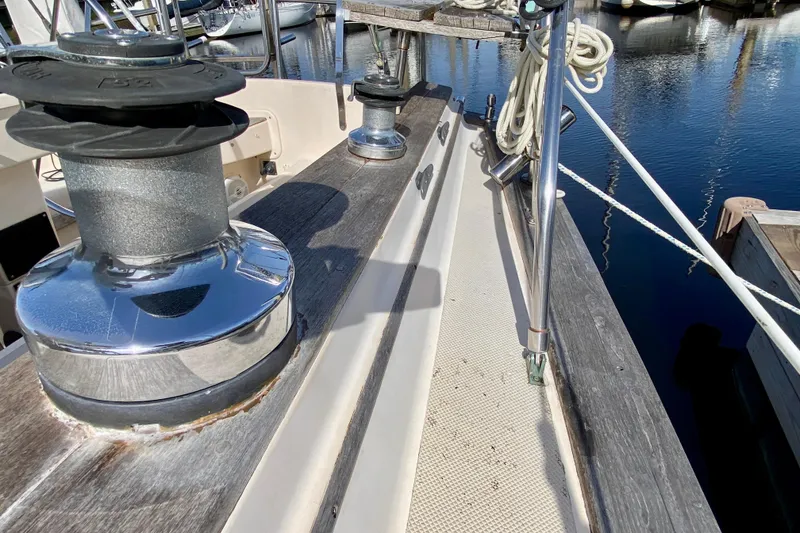 Slide: The Image of Deck view of a 1994 Island Packet 44 sailboat with winches and ropes. - 34