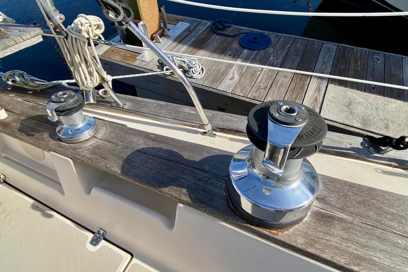 Slide: The Image of Deck of 1994 Island Packet 44 sailboat with winches and ropes. - 35