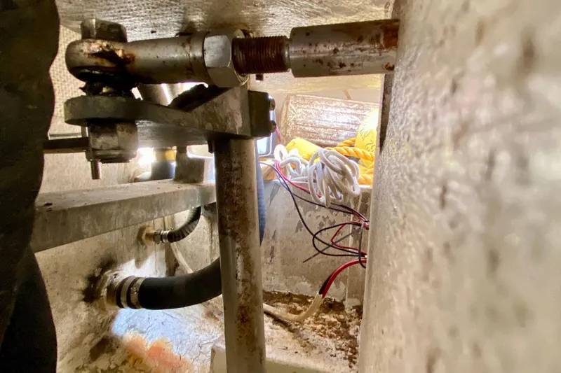 Slide: The Image of Interior view of 1994 Island Packet 44 sailboat showing mechanical components and wiring. - 48