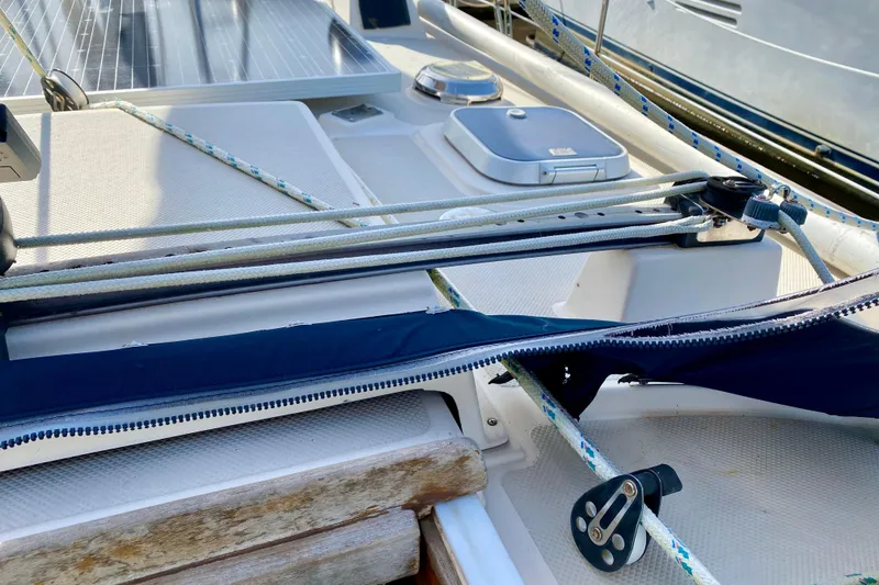 Slide: The Image of Deck of 1994 Island Packet 44 sailboat with rigging and solar panel. - 62