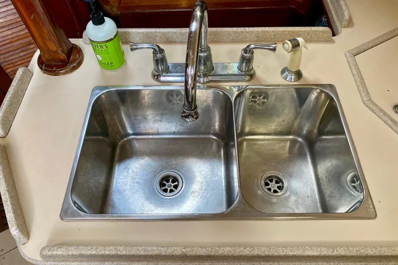 Slide: The Image of Stainless steel double sink in 1994 Island Packet 44 yacht kitchen. - 72