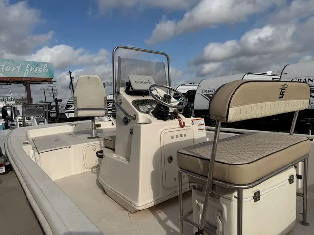 Slide: The Image of 2020 Carolina Skiff 19SWS boat with console and seating. - 15