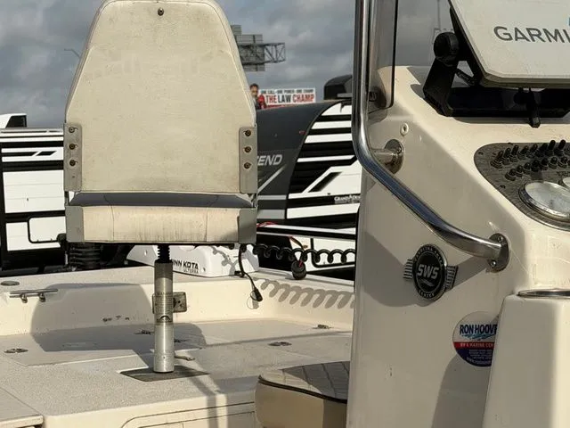 Slide: The Image of Close-up of 2020 Carolina Skiff 19SWS boat deck with seat and console. - 17