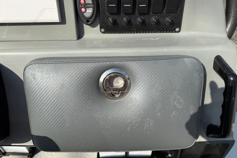 Slide: The Image of 2018 SCB Stingray dashboard with control panel and storage compartment. - 20