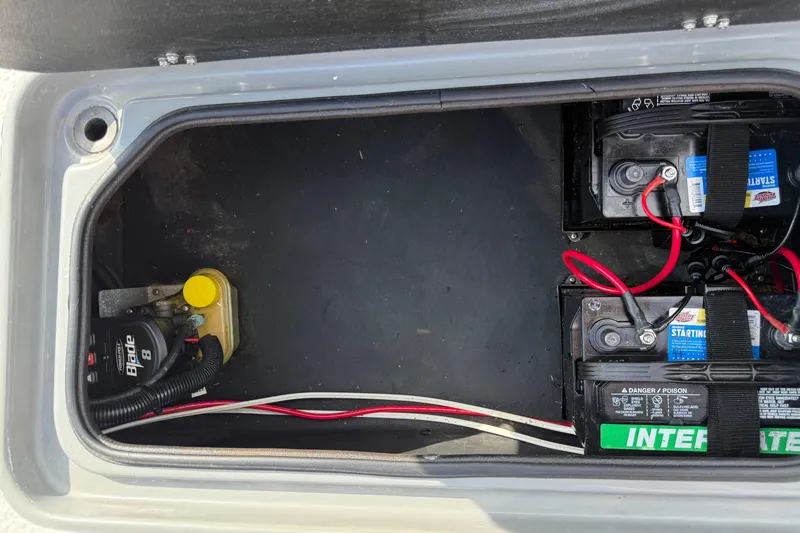 Slide: The Image of 2018 SCB Stingray battery compartment with wiring and dual batteries. - 39