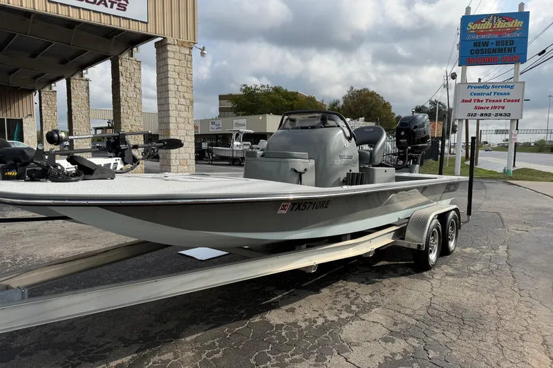 Slide: The Image of 2018 SCB Stingray boat on trailer at dealership, South Austin Marine. - 7