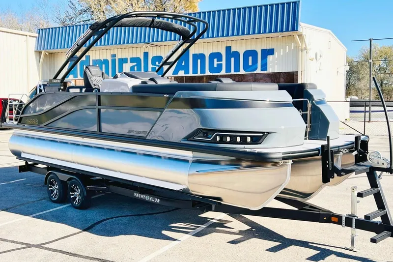 The Image of 2026 Harris Grand Mariner 230 pontoon boat on trailer at Admirals Anchor dealership. - 0