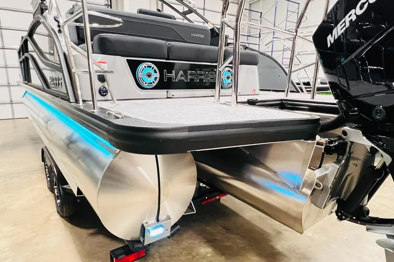Slide: The Image of 2026 Harris Grand Mariner 230 pontoon boat with sleek design and modern features. - 14