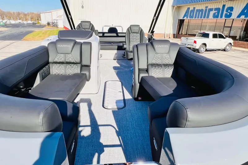 Slide: The Image of 2026 Harris Grand Mariner 230 pontoon boat with luxurious seating and modern design. - 15