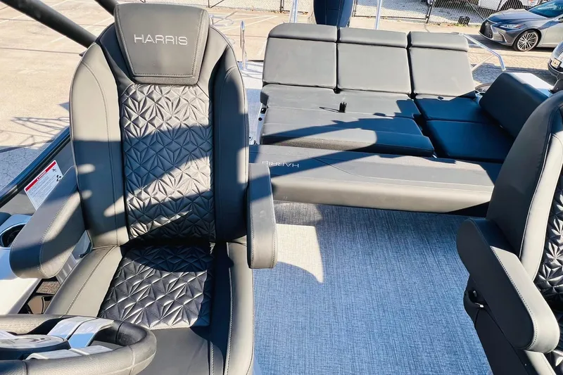 Slide: The Image of 2026 Harris Grand Mariner 230 boat interior with luxurious seating and modern design. - 17