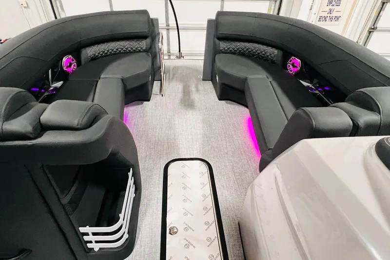 Slide: The Image of Luxurious interior of 2026 Harris Grand Mariner 230 with plush seating and ambient lighting. - 21