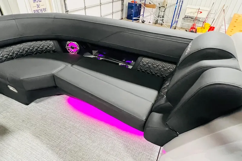 Slide: The Image of Luxurious interior of 2026 Harris Grand Mariner 230 with ambient pink lighting. - 22