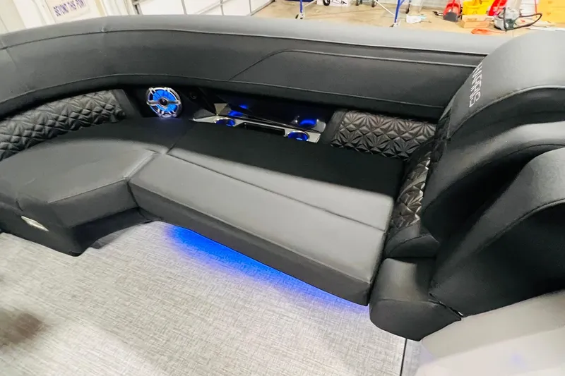 Slide: The Image of Luxurious interior of 2026 Harris Grand Mariner 230 with sleek seating and ambient lighting. - 26