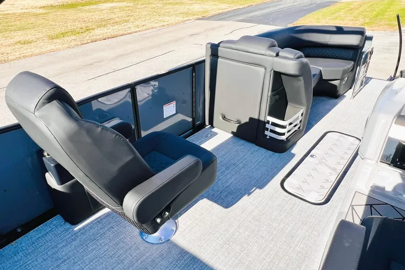 Slide: The Image of 2026 Harris Grand Mariner 230 interior with luxurious seating and modern design. - 28