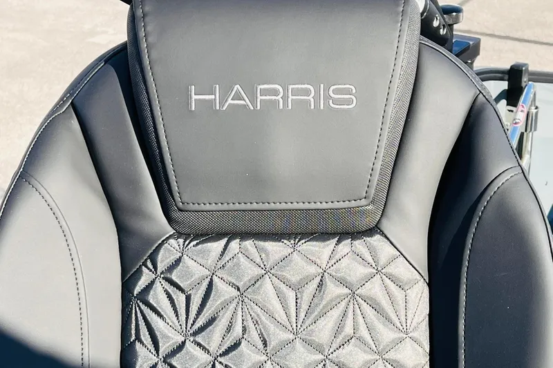 Slide: The Image of Luxurious seat of 2026 Harris Grand Mariner 230 with intricate stitching and branding. - 46