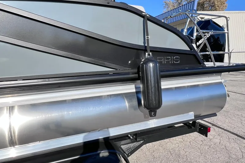 Slide: The Image of 2026 Harris Grand Mariner 230 pontoon boat with sleek design and Mercury engine. - 57