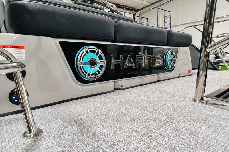 Slide: The Image of 2026 Harris Grand Mariner 230 boat interior with illuminated speakers and sleek design. - 64