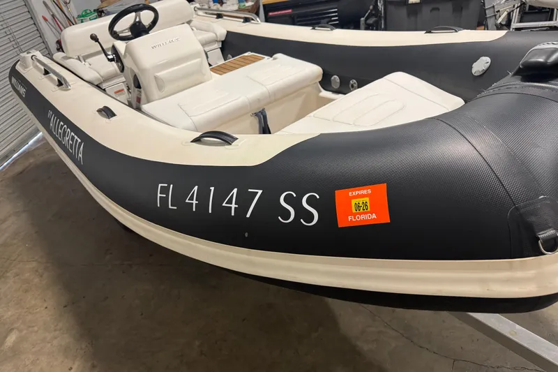 Slide: The Image of 2020 Williams Jet Tenders Sportjet 435 with Florida registration, docked indoors. - 1