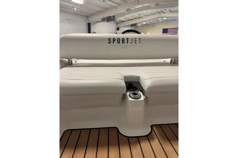 Slide: The Image of 2020 Williams Jet Tenders Sportjet 435 interior seating with teak flooring. - 8