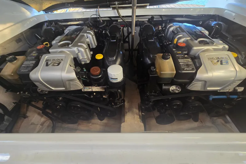 Slide: The Image of Twin V8 engines in a 2013 Formula 310 Sun Sport boat, showcasing powerful performance. - 17