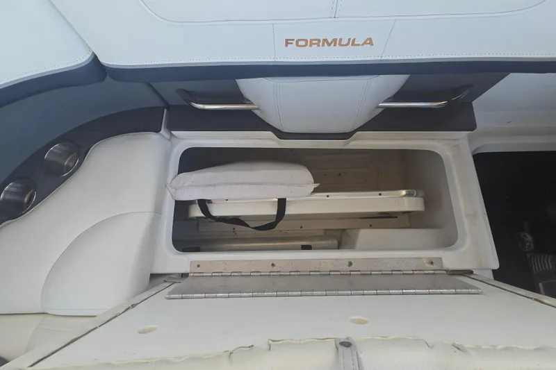 Slide: The Image of Interior storage compartment of a 2013 Formula 310 Sun Sport boat. - 29