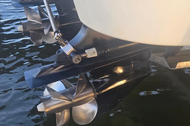 Slide: The Image of 2013 Formula 310 Sun Sport boat propellers in water, close-up view. - 9