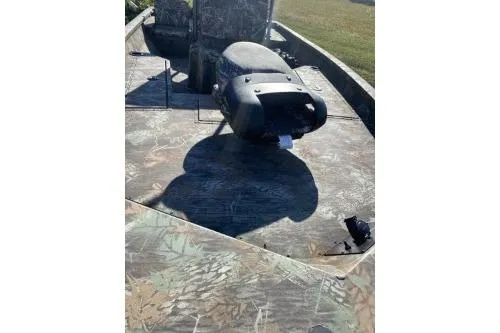 Slide: The Image of 2026 G3 Bay 19 GX boat with camo deck and seating. - 7