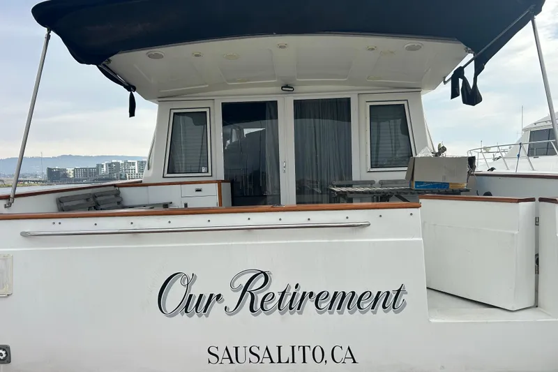 Slide: The Image of Navigator 53 Classic yacht named "Our Retirement" docked in Sausalito, CA, 1996 model. - 30