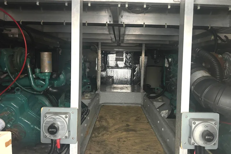 Slide: The Image of Engine room of a 1996 Navigator 53 Classic yacht, showcasing mechanical components. - 31