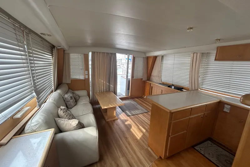 Slide: The Image of Interior of 1996 Navigator 53 Classic yacht with modern furnishings and wood accents. - 9