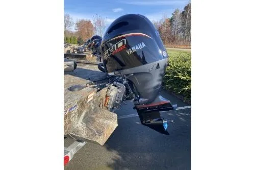 Slide: The Image of 2026 G3 Bay 19 GX boat with Yamaha outboard motor on a trailer. - 4