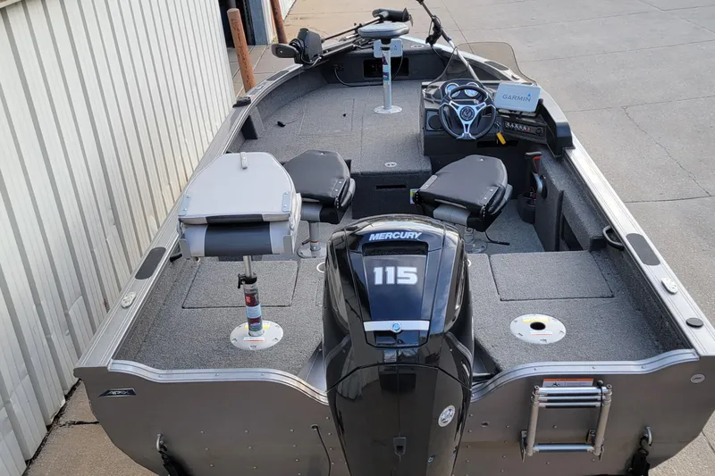 Slide: The Image of 2022 Crestliner 1750 Fish Hawk WT boat with Mercury 115 engine, interior view. - 1