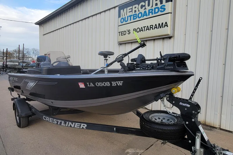 Slide: The Image of 2022 Crestliner 1750 Fish Hawk WT boat on trailer outside Mercury Outboards dealership. - 16