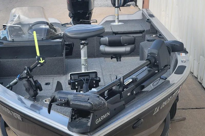 Slide: The Image of 2022 Crestliner 1750 Fish Hawk WT boat with Garmin equipment and seating. - 2