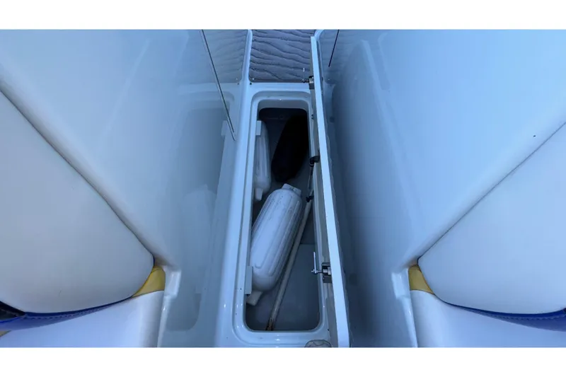 Slide: The Image of Interior storage compartment of a 2008 Baja 277 Islander boat. - 30