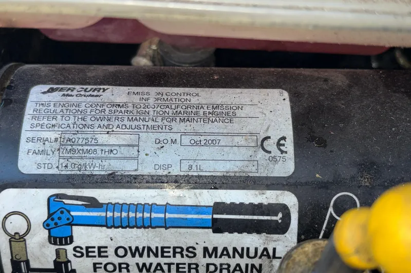 Slide: The Image of 2008 Baja 277 Islander engine label, Mercury emission control information, serial number IA077575. - 43