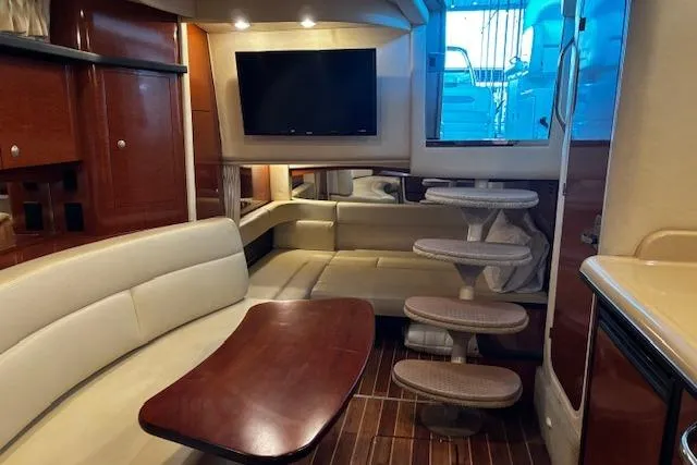 Slide: The Image of Luxurious 2005 Sea Ray 340 Sundancer interior with elegant seating and modern amenities. - 17