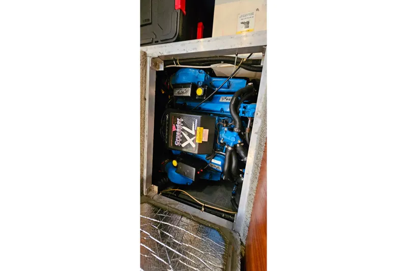 Slide: The Image of Engine compartment of 1994 Carver 390 Cockpit Motor Yacht with Crusader XL engine. - 39