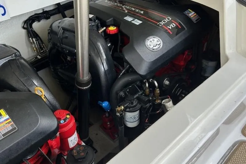 Slide: The Image of Engine compartment of a 2014 Cobalt 302 boat with Volvo Penta 300 V8 engine. - 16