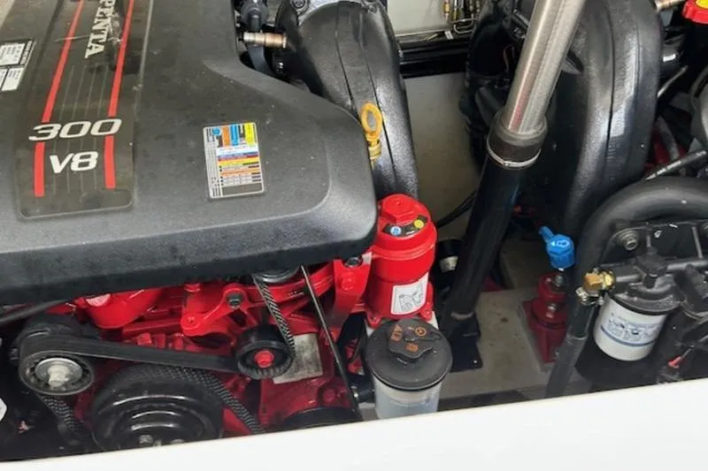 Slide: The Image of 2014 Cobalt 302 engine compartment featuring a Volvo Penta 300 V8 engine. - 17