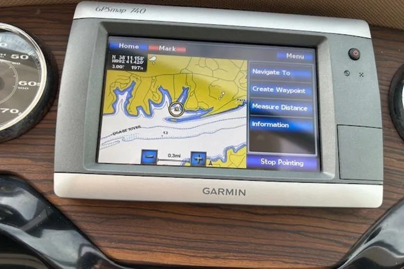 Slide: The Image of Garmin GPSmap 740 on 2014 Cobalt 302 boat dashboard, displaying navigation map. - 21