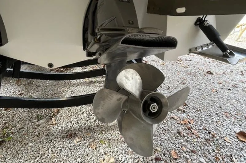 Slide: The Image of Propeller of a 2014 Cobalt 302 boat on gravel surface. - 8