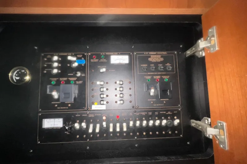 Slide: The Image of Electrical control panel inside 2001 Cruisers Yachts 3572 Express boat. - 20