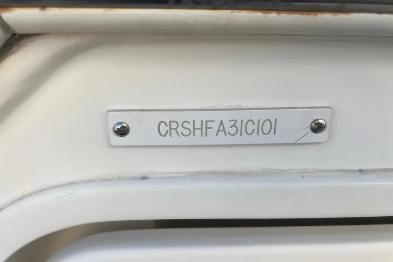 Slide: The Image of 2001 Cruisers Yachts 3572 Express hull identification number plate. - 32